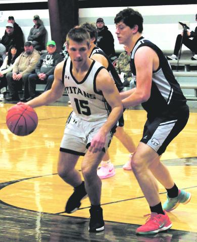 Pushing forward, DVE junior Isaac Feltman fights against a North Prairie defender. Photo by Jamie Rarick