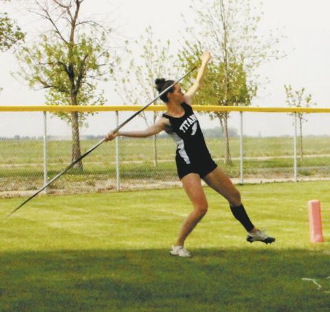 Elizabeth Fedje launches the javelin, winning the regional championship in the event with a distance of 115' 6' at the North East Region Meet. Photo by Jamie Rarick