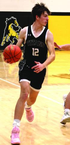 A big congratulations goes out to Titans Varsity basketball player Everett Fedje, who not only made All District, but also scored his 1,000th career point this season Photo by Lyle Van Camp.