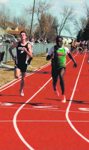 DVE senior Brady Reilly sprinted hard to the finish line against East Grand Forks competitor in the men’s 100 meter dash during the meet in Grafton last week. Reilly had a successful day, earning state qualification in both the 200 m and 400 m events. Photo by Jamie Rarick