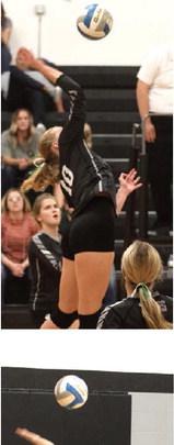 Easton Larson puts down a kill attempt in action against Thompson in Drayton last week.