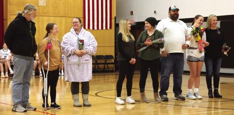The Titan's celebrated Senior Night on Thursday evening of last week in the Drayton gym. Pictured from the left are; Stephen, Siobhan, and Lindsay Kissee; Claire and Kayla Thompson, Mike Berg, Hailey Berg, and Barb Sapa