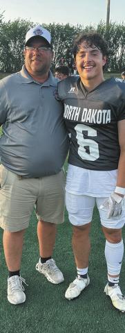 North Border head coach Tim Hartje and Eagles player Grant Cosley were both invited to the 51st North Dakota Shrine Bowl, held in Mayville on June 21. Photo by Larry Stokke.
