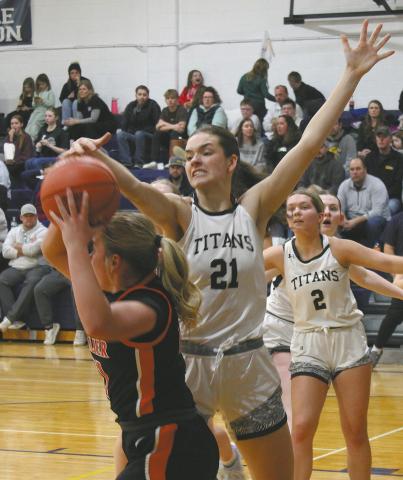 DVE senior Elizabeth Fedje fights for the ball. Photo by Jamie Rarick
