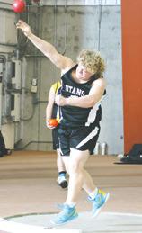 Bryce Wimpheimer's second attempt at the shot put. Photo by Lyle Van Camp.