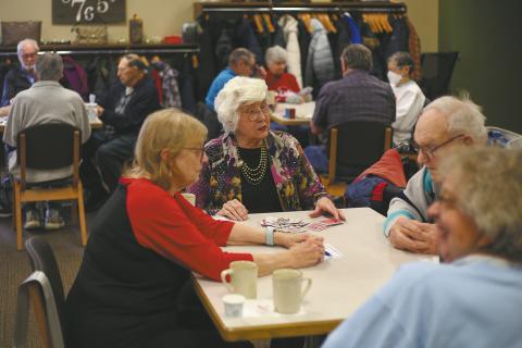 People gather at the Broadway Station Senior Center in Fargo on Wednesday, Dec. 10, 2025, for Pinochle Day. Chris Flynn / The Forum