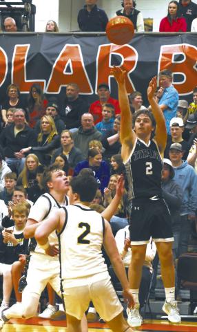 DVE's Teddy Otto goes for three during Tuesday night's game against Park River. Photo by Jamie Rarick