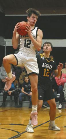 Everett Fedje pulls down a rebound against Park River last Tuesday.