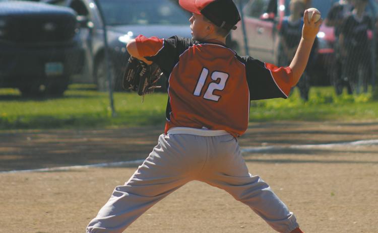 Drayton hosted the Silver Division 10U Baseball Tournament on Saturday, July 11. It was the fi rst time in more than 10 years that Drayton hosted a baseball tournament above the tee-ball level. Mother Nature threw players and fans a curveball with extreme heat, but with the help of community volunteers, the tournament was a success. KodaBank provided free bottled water in each dugout to help keep players and coaches hydrated throughout the day. The tournament featured several close games, beginning with the