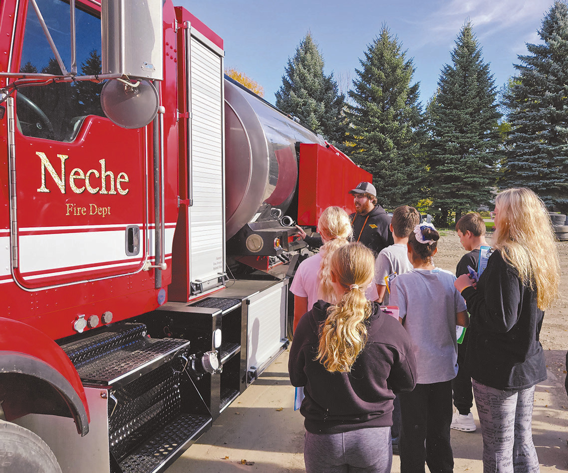 Drayton seventh graders visited CVR Industries in Neche and learned how the company repurposed an old milk truck into a fire truck for the Neche Fire Department. Photo by Jamie Rarick