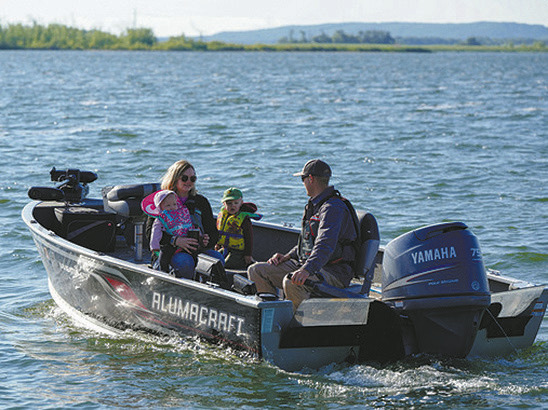 North Dakota state law requires kids 10 and under to wear a life jacket in boats under 27 feet. Photo by NDGF
