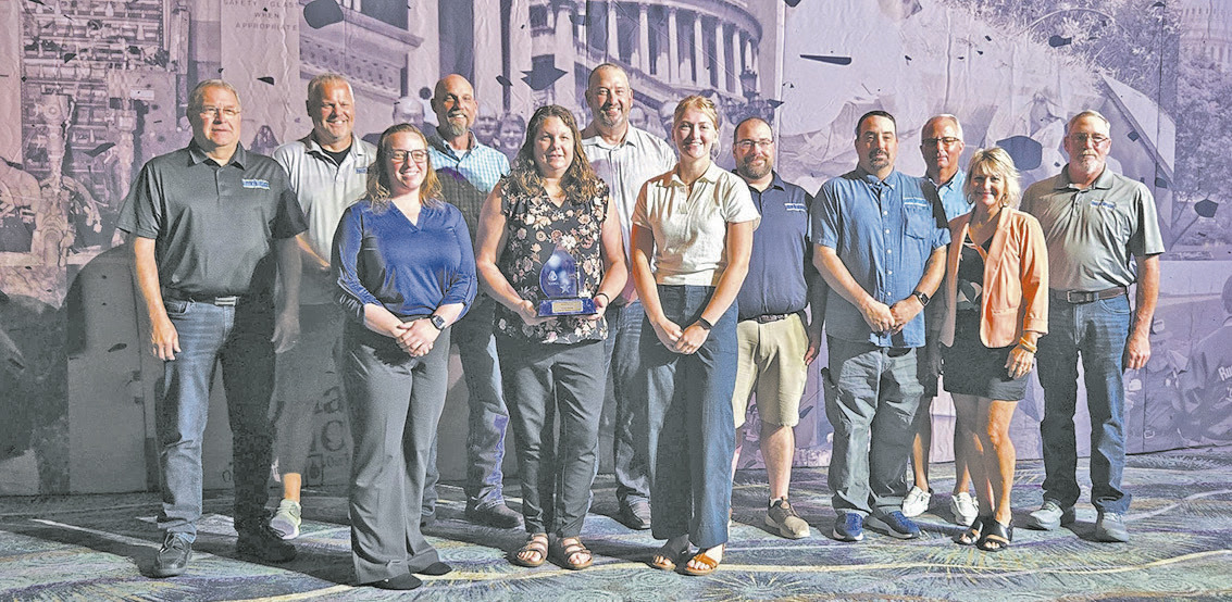 North Dakota Rural Water Systems Association (NDRWSA) is presented with the Outstanding Achievement in Member Services award by the National Rural Water Association. Submitted photo