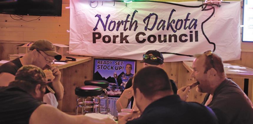 Judging Ribfest is serious business. This year and in the years to come The North Dakota Pork Council is one of the sponsors of the contest. This years winners were: 1st place - Big Papa BBQ, Christian Beatty, 2nd place - Burt Jackson, 3rd place - John Lunski. VNV Photo by Lesa Van Camp