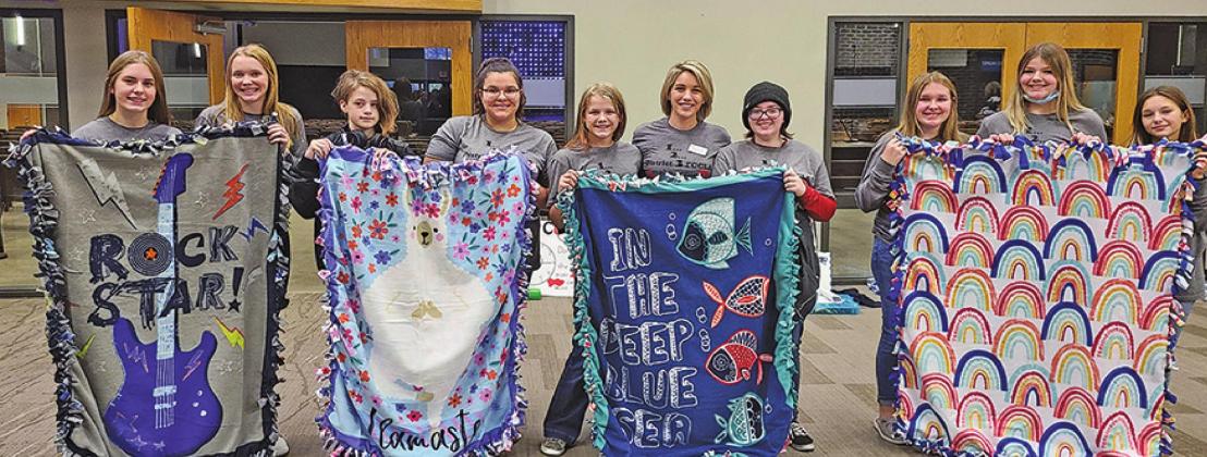 Pictured above with their blankets (L to R): Chapter Vice President Kiara Aasand, Easton Larson, Stephanie Kissee, Aaliyah Lorenzen, Alyssa Hoyles, Chapter Adviser Sarah Hillier, Chapter President Jordie Praska, Rylee Maurstad, Alyvia Quibell, Taylor Hermanson. Photo submitted