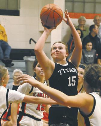 Aleah Pokryzwinski shoots through a crowd in action at Cavalier last week. Photo by Lyle Van Camp