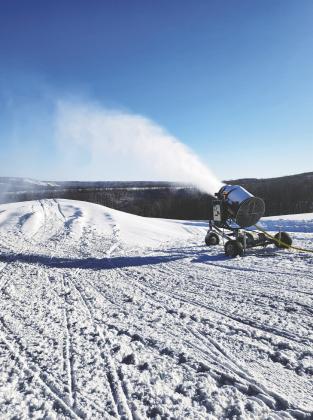 A snow gun makes snow at Frost Fire Park ahead of the 2021-2022 winter season. Photo credits to Sarah Hinnenkamp.