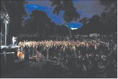 A crowd of thousands of worshippers gather in the Cavalier City Park for Off the Charts as Tenth Avenue North performs. Photo by Larry Stokke