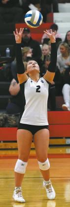 Brooke Gullickson sets the ball in the Region 2 tournament against New Rockford Sheyenne. Photo by Larry Stokke.