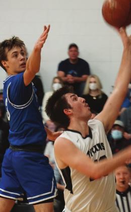 Tyson Backer puts up a shot in action last Friday in Drayton. VNV photo by Lyle Van Camp