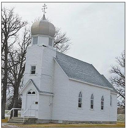 Shown is the former Icelandic Evangelical Lutheran Church, and former Ukrainian Greek Orthodox Church of St. John in Pembina, N.D., which is on the National Register of Historic Places. (Photo Courtesy of State Historical Society of North Dakota)