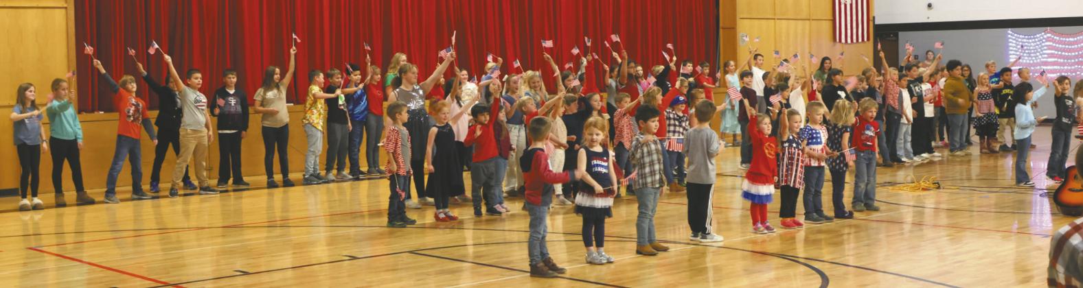 Students in grades pre-k through six presented a patriotic Veterans Day program on Thursday afternoon of last week. Photo by Lyle Van Camp