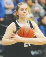 Kiara Aasand looks for an open player. Photo by Lyle Van Camp.