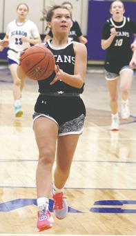 Brooke Gullickson drives the lane at Hillsboro. Photo by Lyle Van Camp.