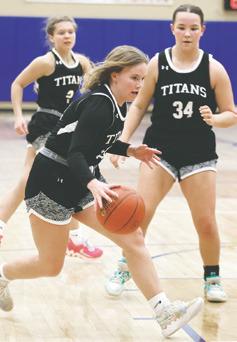 Aleah Pokrzywinski drives the lane at H-CV. Photo by Lyle Van Camp.