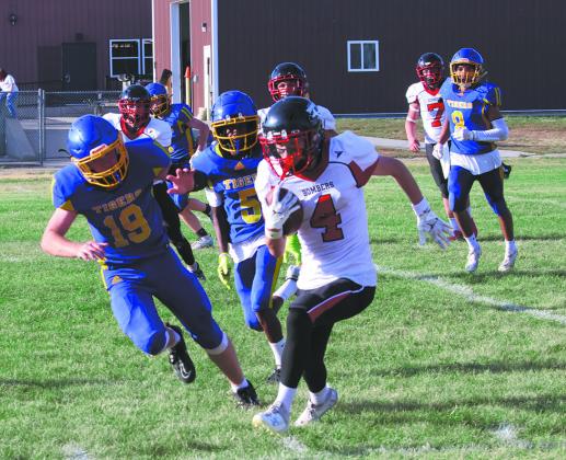 #4 Trypp Castillo sprints out of bounds to extend a Bomber drive. Photo by Jamie Rarick