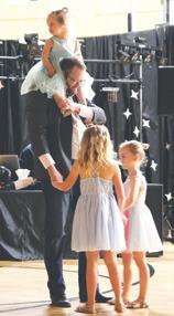 Millie, Dan, Evie and Lauren Hillier dancing after the grand march. Photo by Lyle Van Camp.