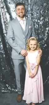Brandon and Eleanora Patterson pose for their formal portrait. Photo by Lyle Van Camp.