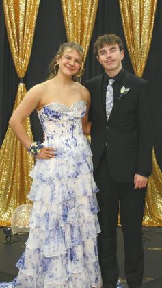 Violet Hoyles escorted by Bridger Latozke