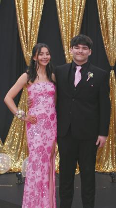 Milla Fagerholt escorted by Praise Chairez