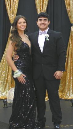 Taylor Hermanson escorted by Raymond Dominguez