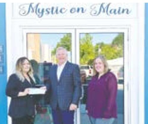 L to R – Mystic on Main owner Krystal Gire, Polar board member Wes Welch, and Walsh County JDA director Angelle French.
