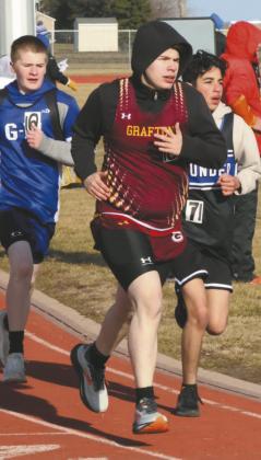 Running the 800m for the Spoilers, Drayton resident Tayden Markel pulls ahead of competitors in his heat. Photo by Jamie Rarick