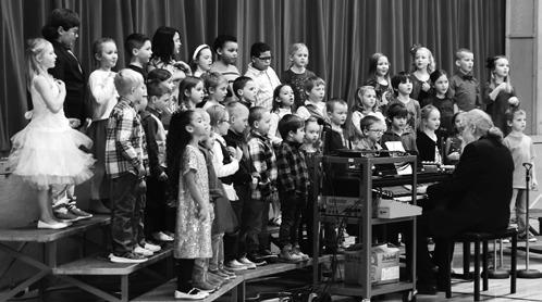 Pre-K - 2nd grade performing at the Christmas Concert. Photo by Lyle Van Camp.