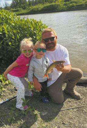 Kameron Dahl and his children. Submitted by Katie Dahl