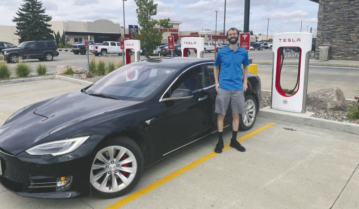 Brian Kopp outside the Tesla Supercharger at Prairie Hills Mall, Dickinson on Aug. 25, 2022. Photo Michael Standaert.