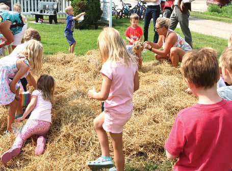 Kiddos had a blast at the Kodabank coin scramble on Friday. Photo by Lyle Van Camp.