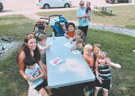 Daniellia Pokrzywinski, Director of Big Hearts Daycare in Drayton, brought her group to the Blessing Museum &amp;amp; Square for free floats, rock painting, chips, hotdogs, coin scramble, and much more. Big Hearts opened in October and plans to make this field trip an annual event. Photo by Duane H.H. Lyon