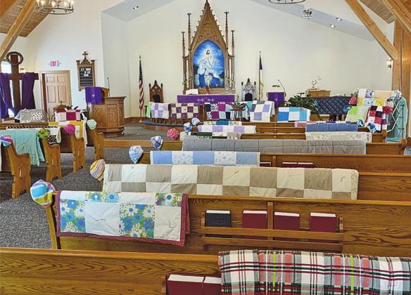 Skjeberg WELCA quilting and sewing mission projects on display in the Skjeberg Lutheran Church prior to being blessed and distributed. Photo submitted by Laura Hammond