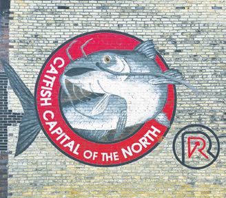 Drayton’s new water tower will be embellished with the Catfish Capital’s logo, matching this mural on Main Street. Photo by Hilary Nowatzki.