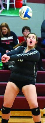 Hailey Hurtt bumps the ball across the net Monday night against the Midway Minto Mustangs. VNV Photo by Lesa Van Camp