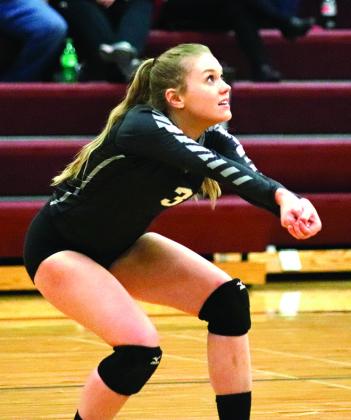 Katelyn Oberg bumps the ball during a volley with the Mustangs. VNV Photo by Lesa Van Camp