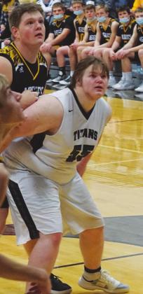 Joey Bjornson holds off two Park River defenders in action in Edinburg.