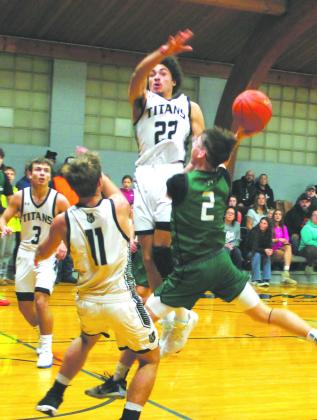 DVE's Carter Oberg comes down with the rebound. Photo by Jamie Rarick.
