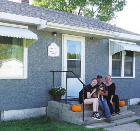 Adelaine, Tanz, and Paula Chalmers in front of Adelaines House, a new Air BNB opening in Drayton. VNV photo by Lyle Van Camp