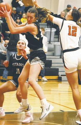 Jaelyn Johnson pulls down a rebound in Cavalier. Photo by Lyle Van Camp