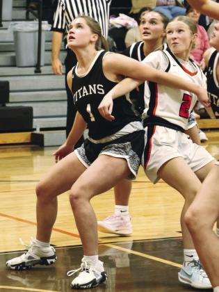 Greta Burrell fights for position on a rebound. Photo by Lyle Van Camp